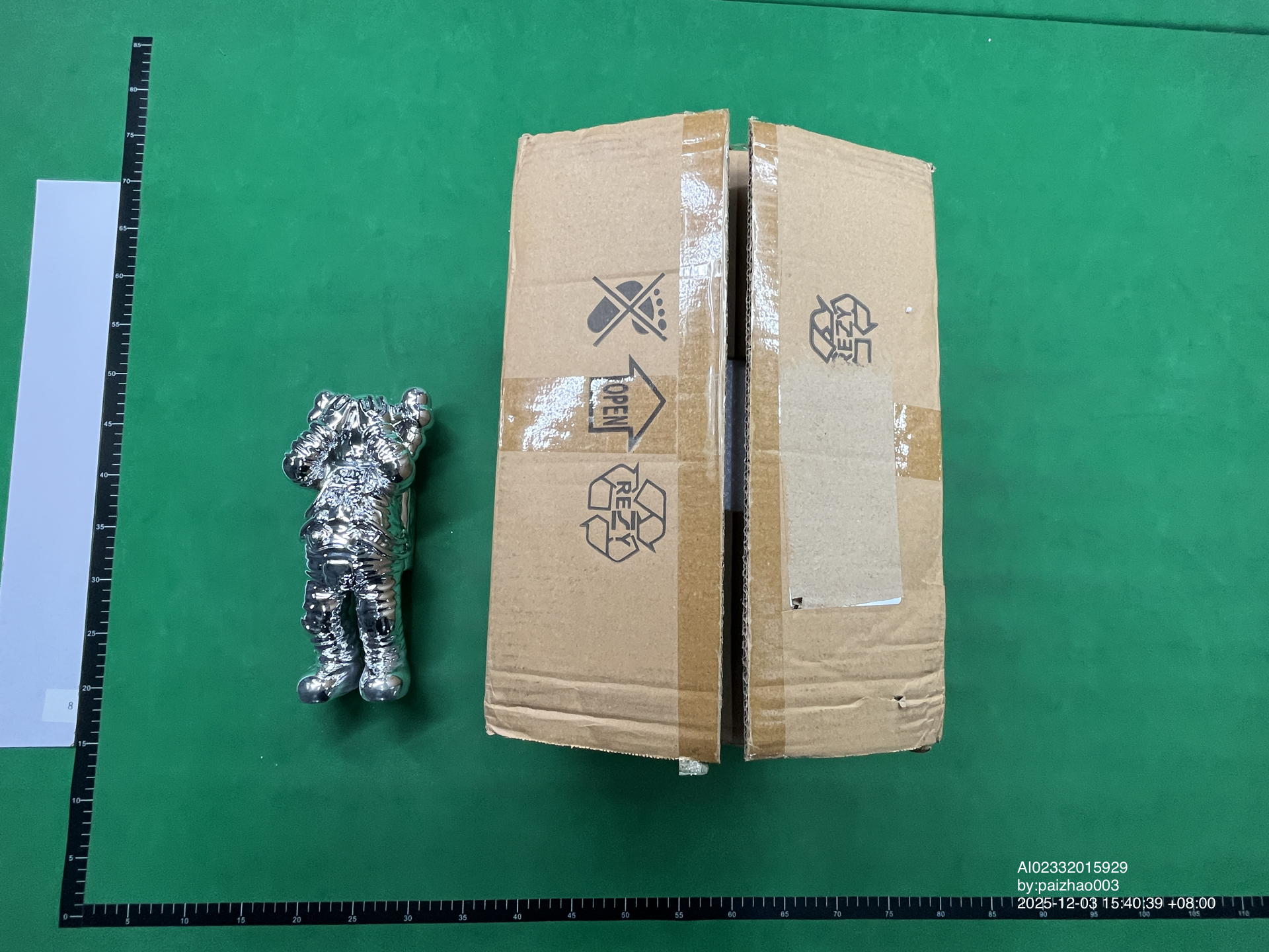 QC Photo - Kaws Astronaut Figure