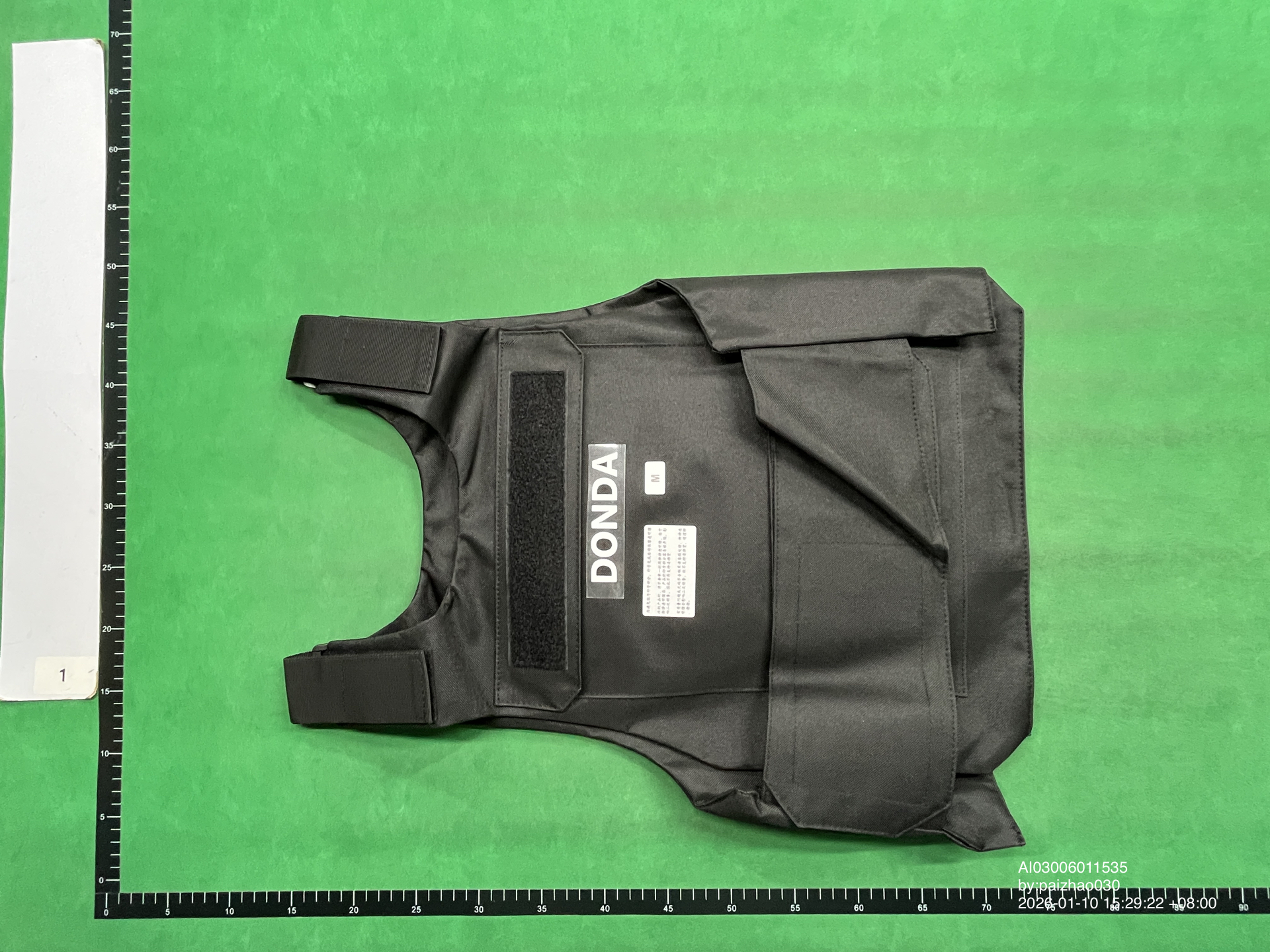 QC Photo - Donda Vest