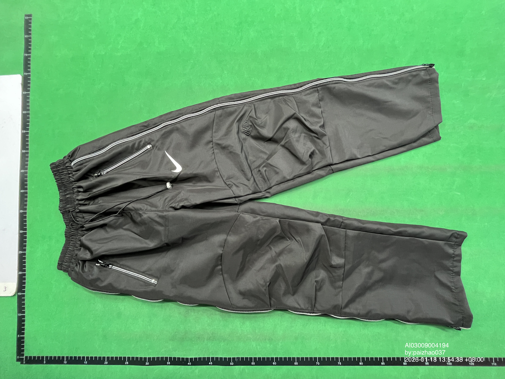 QC Photo - Nike Baggy Track Pants