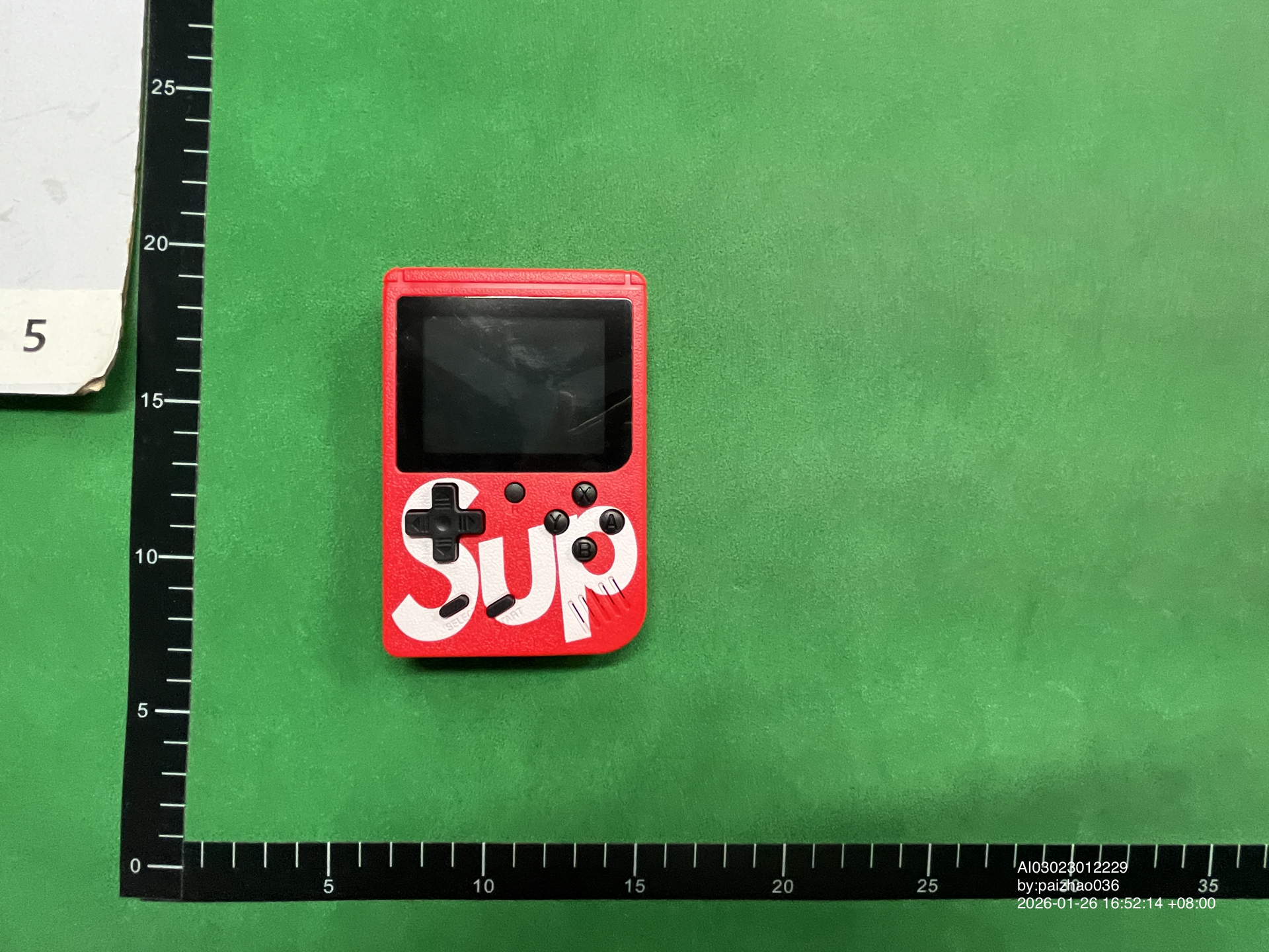 QC Photo - Supreme "Gameboy" Console