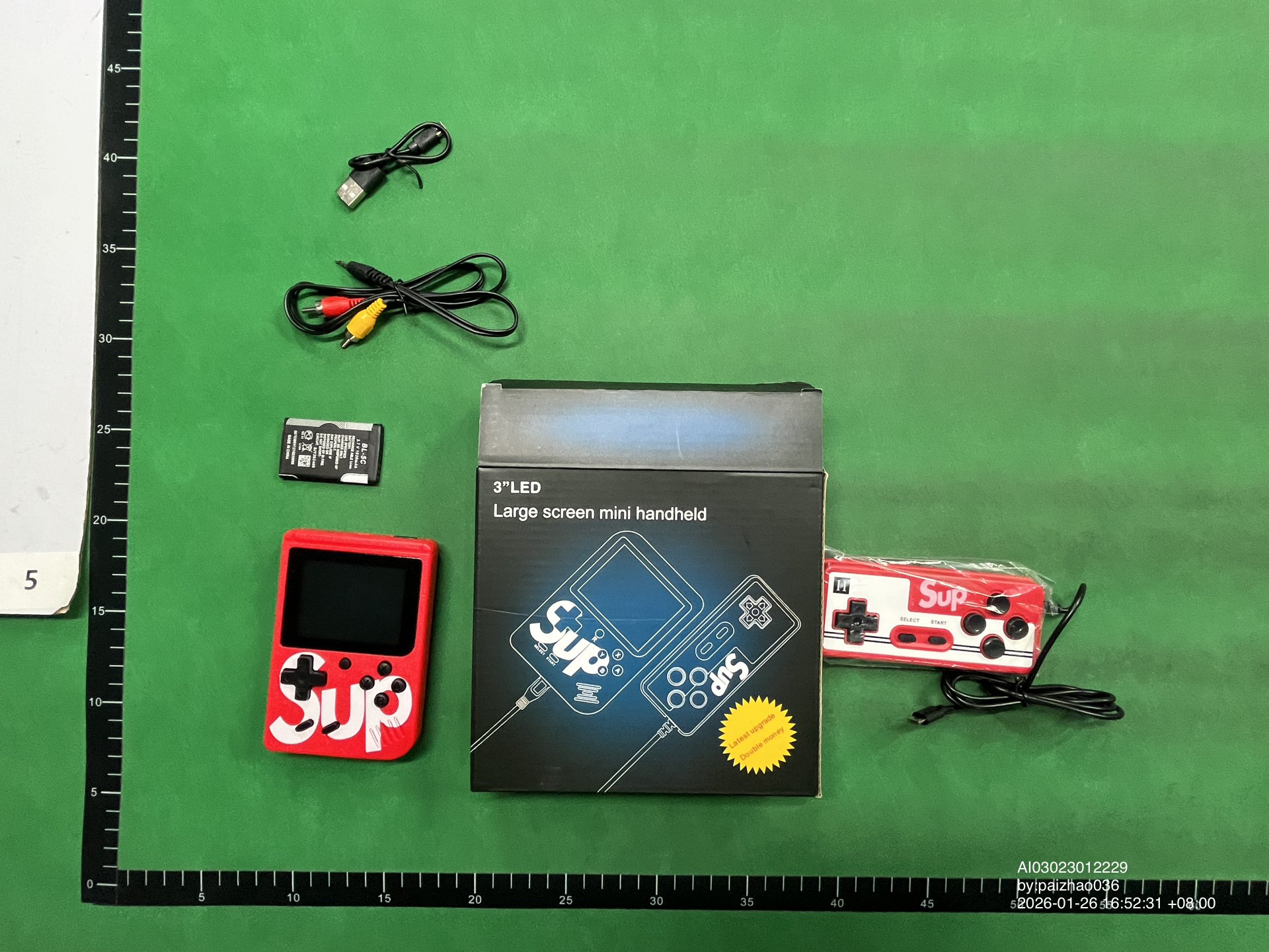 QC Photo - Supreme "Gameboy" Console